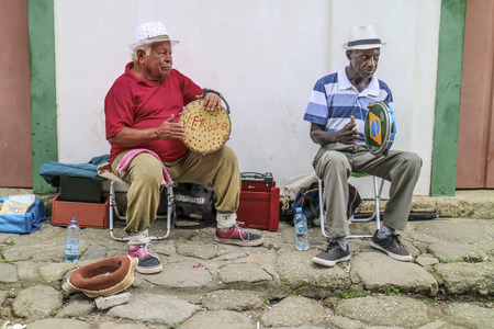 Paraty, Brazil February 26, 2017: Unidentified musicians in the typical stone street in the historical downtown of Paraty, Rio de Janeiro, Brazil.のeditorial素材