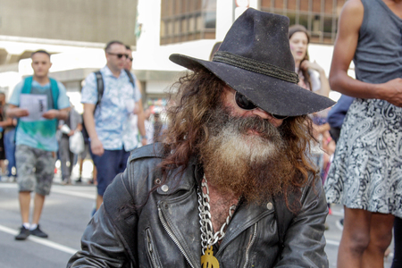 SAO PAULO, BRAZIL - June 18, 2017: An unidentified old man celebrating lesbian, gay, bisexual, and transgender culture in the 21st Gay Pride Parade Sao Paulo.のeditorial素材