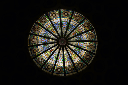 Image of a multicolored stained glass window with regular block pattern in Los Angeles Natural History Museumのeditorial素材