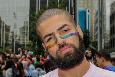 Sao Paulo, Brazil - June 3, 2018: An unidentified man celebrating the lesbian, gay, bisexual, and transgender culture in the 22th LGBTI Pride Parade Sao Paulo.のeditorial素材