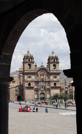 Cuzco, Peru - September 9, 2018: An unidentified group of tourists in front of the old Catholic La Compania de Jesus ( Company of Jesus ) Church in Plaza de Armasのeditorial素材
