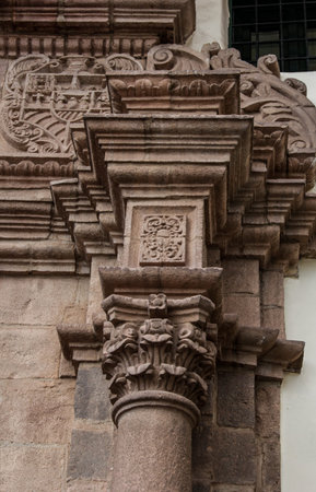 Colonial Catholic church wall architecture detail in Cuzco Peru. Carved in stone by hand.