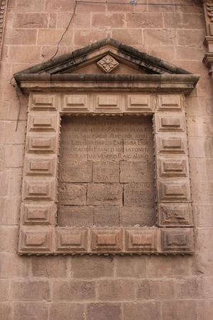 Colonial Catholic church wall architecture detail in Cuzco Peru. Carved in stone by hand.の写真素材