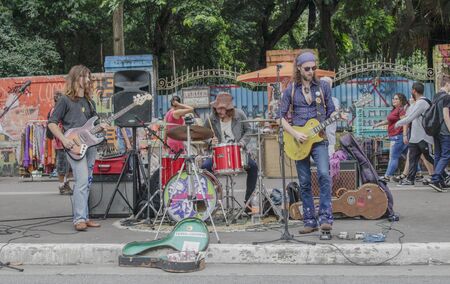 Sao Paulo, Brazil - February 17,2019: Unidentified man playing rock with a band on the Paulista Avenue on a Sunday morning.のeditorial素材