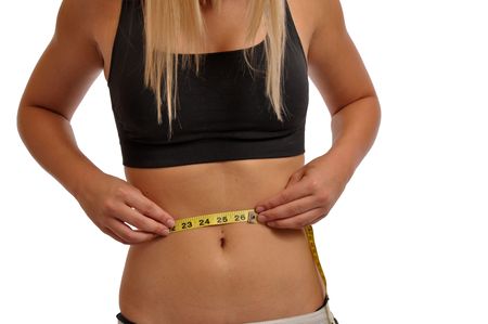 Girl measuring her waist,の写真素材