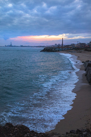 City coast in evening light with clouds and seaの写真素材