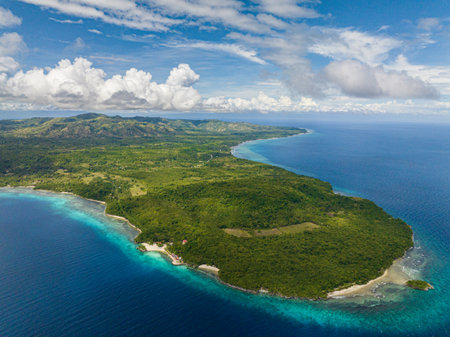 Beautiful eastern side of Siquijor, where Salagdoong Beach is located with a sandy white beach and azure water surrounded by a coral reef. Philippines.の写真素材