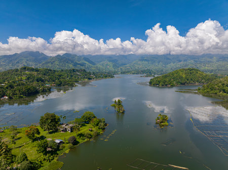 Drone survey of Lake Sebu surrounded by dry land, mountain forest. Mindanao, Philippines. Eco-Tourism destinations.の写真素材