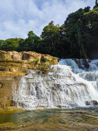 Tinuy-an Falls in Surigao del Sur. Waterfalls with clear water. Philippines.の写真素材