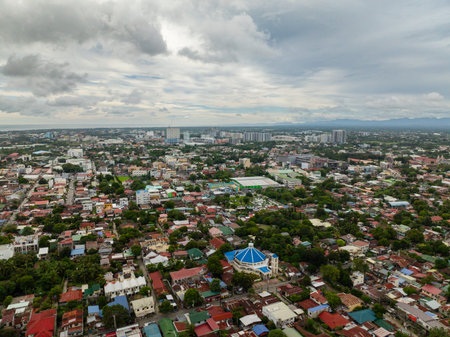 Aerial view of Iloilo City. Commercial buildings and resident area. Panay Island. Philippines.