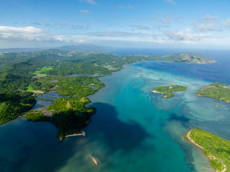 Manamoc and Cabangajan Island with turquoise sea water. Santa Fe, Tablas, Romblon. Philippines.