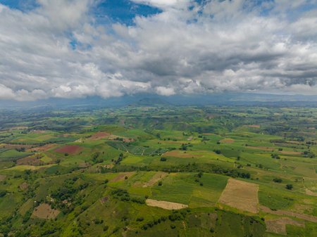 Farmland land and paddy fields. Blue sky and clouds. Mindanao, Philippines.の写真素材