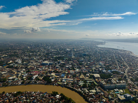 Coastal city with river and building. Davao City. Mindanao, Philippines.の写真素材