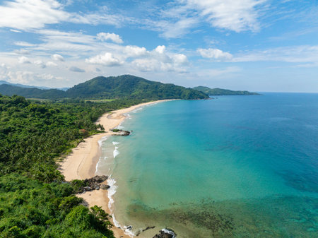Tropical sea waves on sands in Duli Beach. Clear sea water in El Nido, Philippines.の写真素材