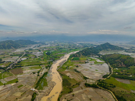 Tropical mountain with farmlands and riverbanks in the Philippines. Mindanao.の写真素材