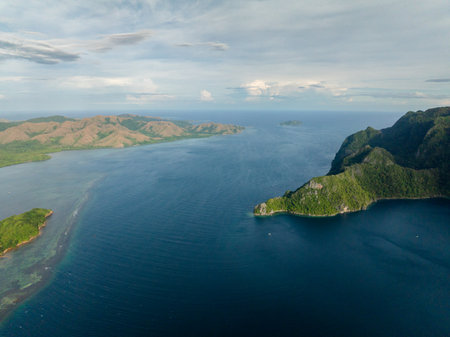 Tropical landscape of Banuang Daan with blue sea. Coron, Palawan, Philippines.の写真素材