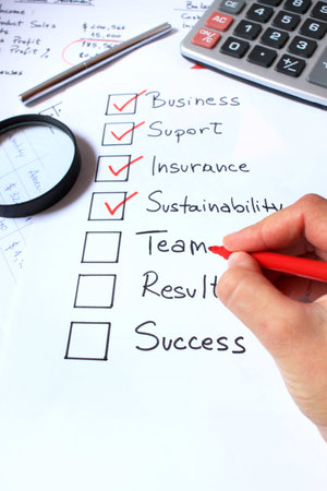 hand checking things needed to start a business