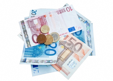 isolated european money placed over each other, euro banknotes and coinsの写真素材