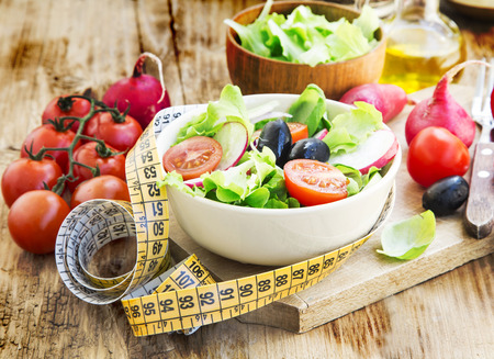 Organic Vegetables Salad with Measure Tape.Healthy Diet Salad Conceptの写真素材