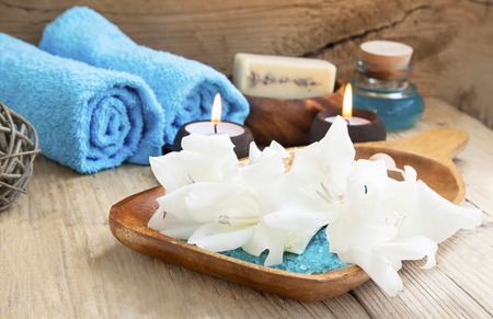 Spa Still Life Setting with White Lilies, Candles and Sea Saltの写真素材