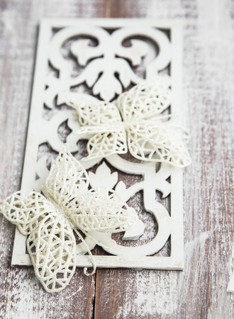 Glittered Butterflies for Christmas Tree on Wooden Decorationの写真素材