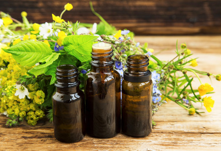 Alternative herbal medicine with medicinal plants essence bottlesの写真素材