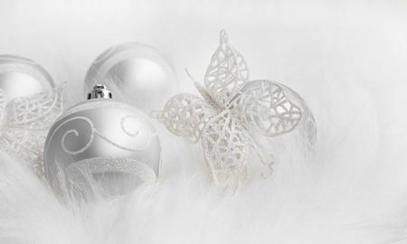 Christmas silver festive decorations in white fur  の写真素材