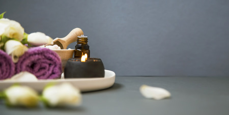 Spa still life, selective focus, with towels,rose flowers, bath salt and candle setting, wellness and spa still life compositionの写真素材