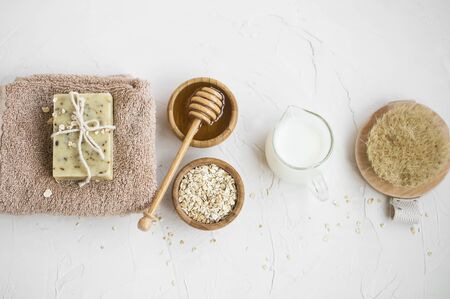 Natural skincare with natural soap, milk, oats and honey soap, homemade beauty products, home spa and beauty care concept, top viewの写真素材