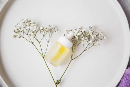 Spa still life with face oil bottle , top view of clean beauty oil treatmentの写真素材