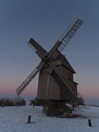 Bockwindmill in krippendorf thuringia at winter historical uprightの写真素材