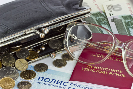 Russian Pension Certificate  and wallet with money and glassesの写真素材