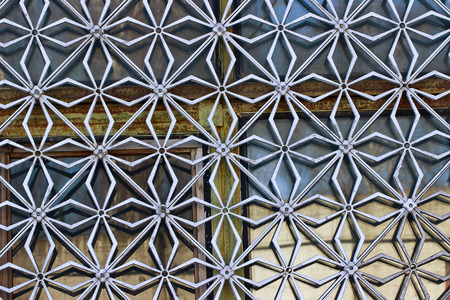 Metal decorative grill on the windowの写真素材