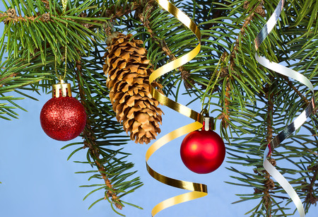 Christmas decoration isolated on the blue backgroundの写真素材