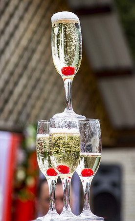 Glasses with champagne on the party tableの写真素材