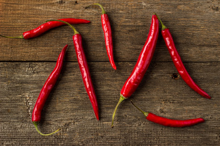 Red Hot Chili Peppers on rustic wooden background