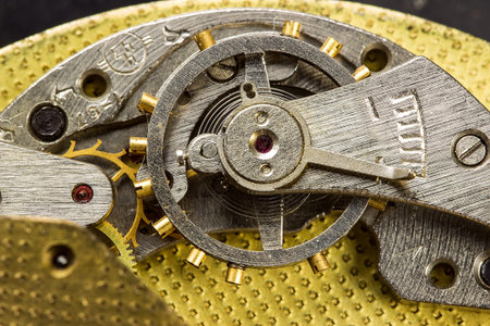 Close-up mechanism of old watch, top view