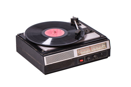 Vintage record player with radio tuner isolated on white background