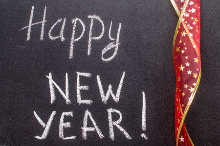 Happy new year 2017, hand writing with chalk on blackboard, vintage conceptの写真素材