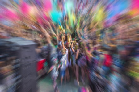 picture with creative zoom effect made by camera of a crowd of people in the cityの写真素材