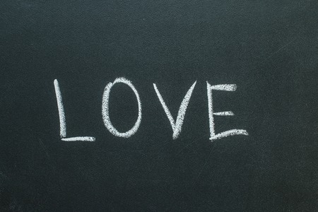 Love text written on chalkboard. Valentine's Day Conceptの写真素材
