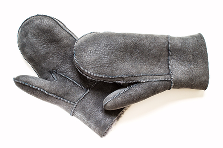 Grey  gloves with natural fur on white backgroundの写真素材