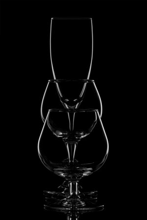 Group of empty wine glasses on blackの写真素材