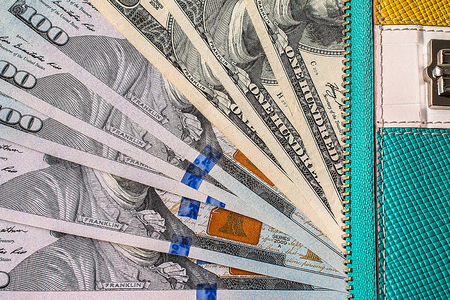 leather wallet with USA dollars money inside it. financial conceptの写真素材