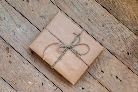 Vintage gift box on old wooden backgroundの写真素材