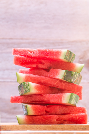 Fresh sliced watermelon  on wooden table.の写真素材