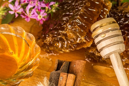 natural organic honey  on a wooden table.の写真素材
