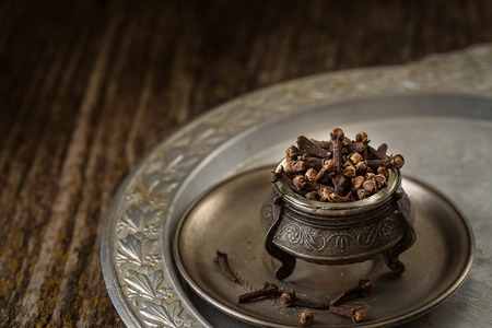 Still life.Composition with different types of spices with bright colors on rustic wooden table. Colorful spices. Organic food, healthy lifestyle, space for textの写真素材