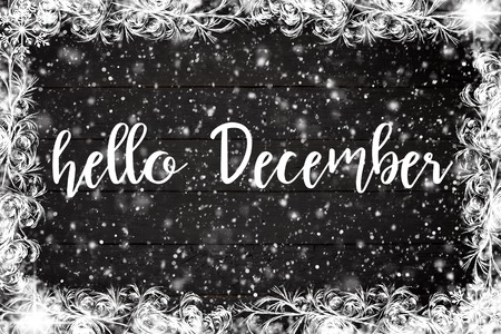 HELLO DECEMBER handwritten inscription. Winter holiday composition. New Year and Christmas celebration. Winter holidays concept. Christmas decorations. Top View.の写真素材