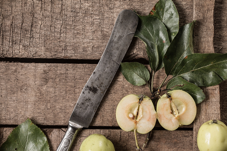 Red and green apples on rustic wooden background. apples on rustic kitchen table background. Top view,  Flat layの写真素材